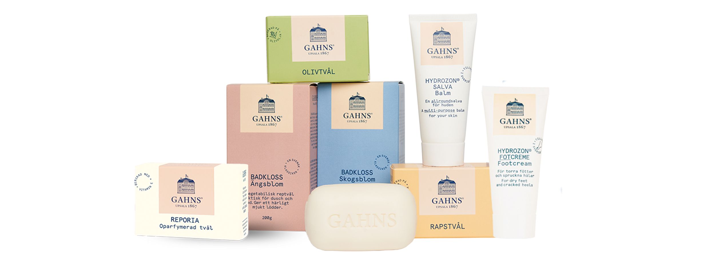 Flera Gahns hudvårdsprodukter står uppradade, inklusive tvålar, krämer och förpackningar i olika färger.