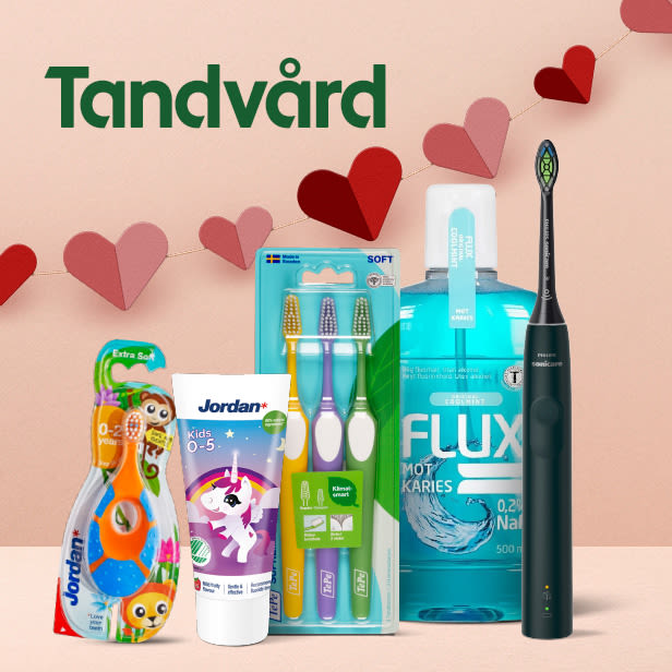 Tandborstar, tandkräm och munskölj arrangerade under texten "Tandvård" med pappershjärtan som bakgrund.