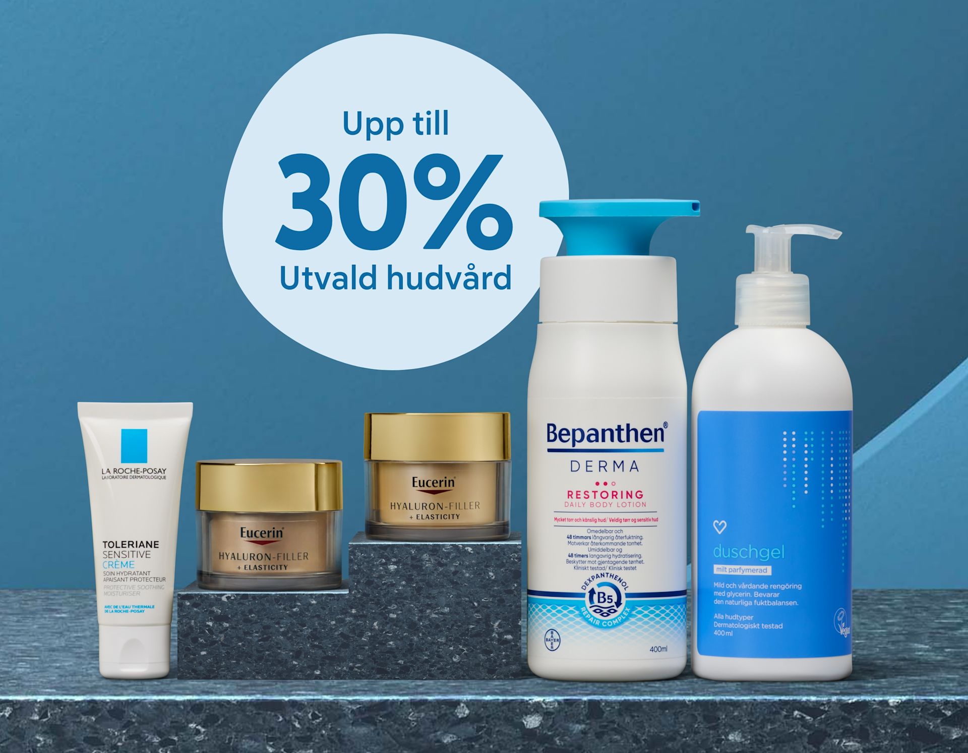 Flera hudvårdsprodukter från La Roche-Posay, Eucerin och Bepanthen står på en marmorbänk med en blå bakgrund och texten "Upp till 30% utvald hudvård".